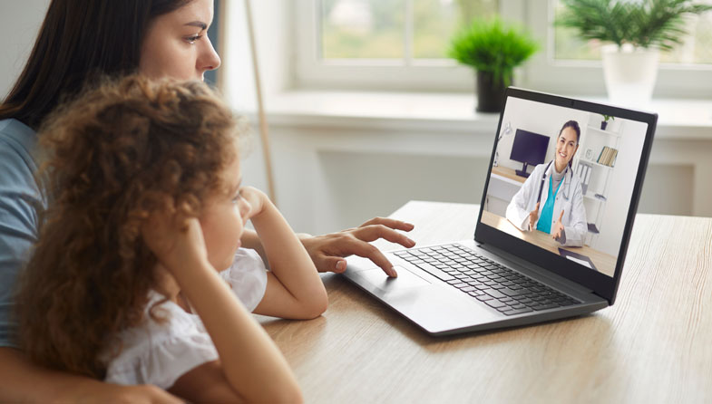 woman and child using virtual healthcare